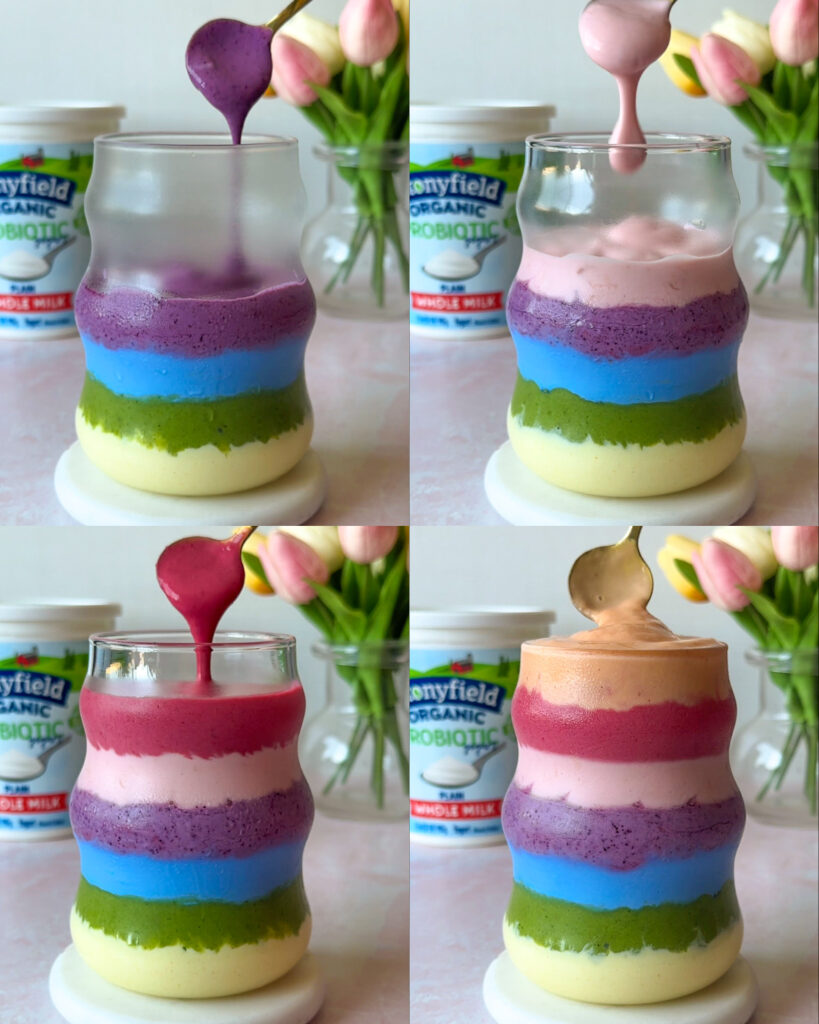 Step-by-step assembly of layered rainbow smoothie layers in a glass using natural ingredients