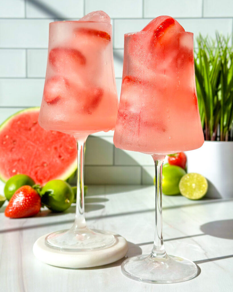 Watermelon strawberry ice cubes sparkling summer mocktail